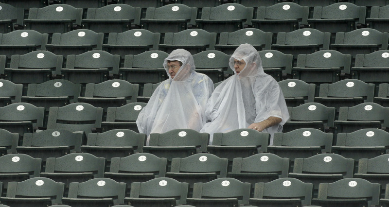 sports rain Fans in Ponchos